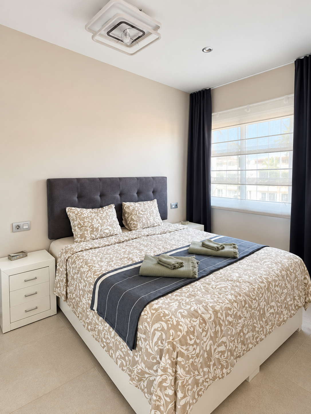 Bright Minimalist Bedroom with Patterned Bedding