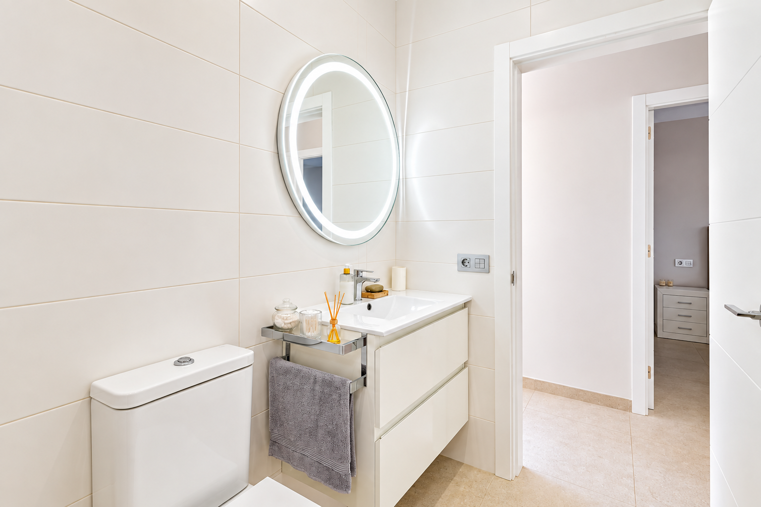 Modern Cream Bathroom with Illuminated Mirror